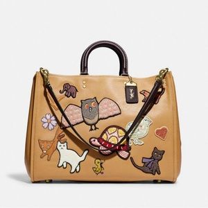 COACH rogue 39 with creature patches. NWT and dust bag! Never worn!